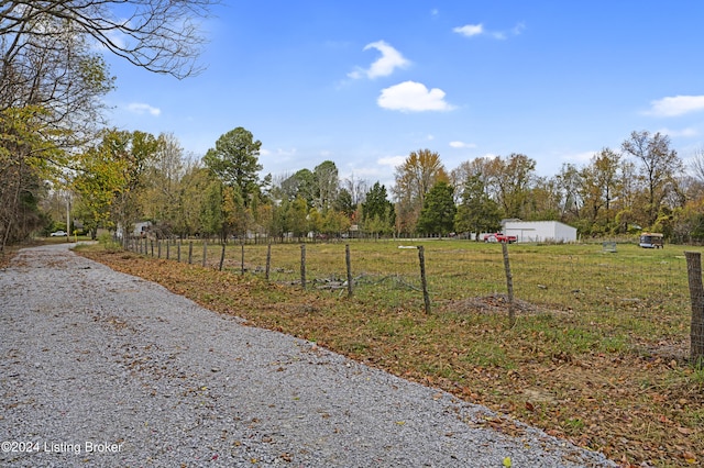 view of road featuring a rural view