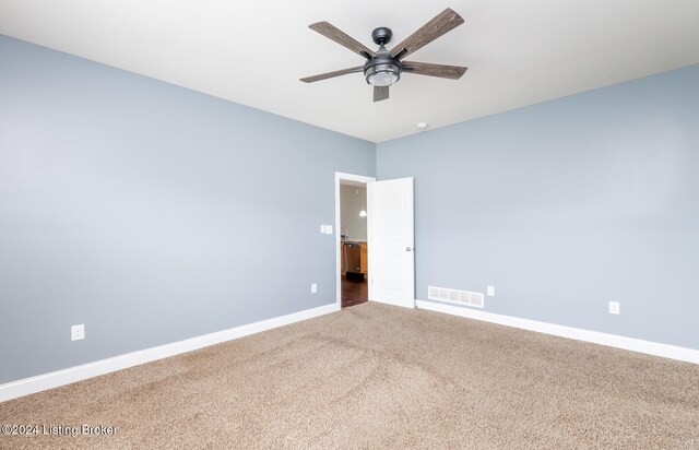 unfurnished room featuring carpet flooring and ceiling fan