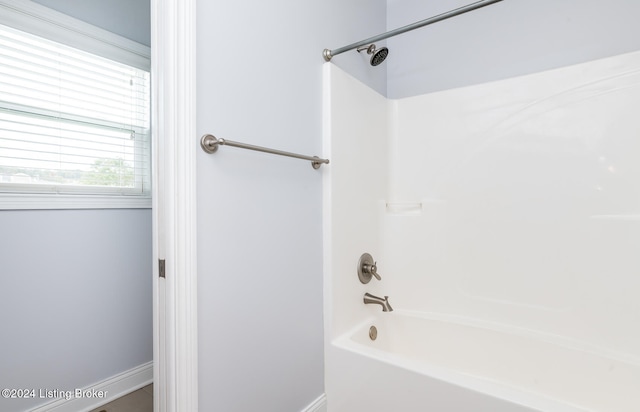 bathroom featuring shower / washtub combination