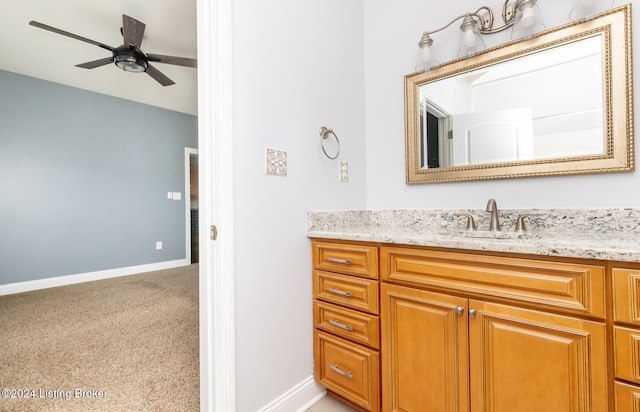 bathroom featuring vanity and ceiling fan