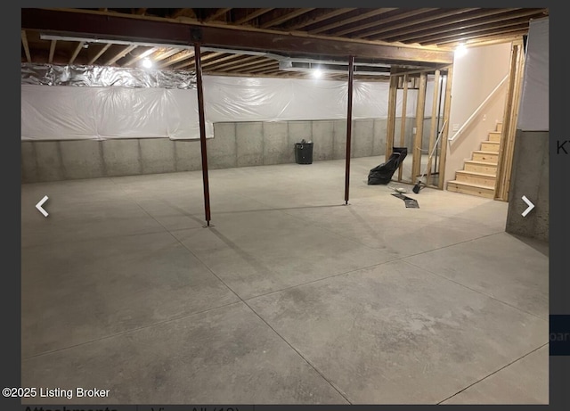 unfinished basement with stairs