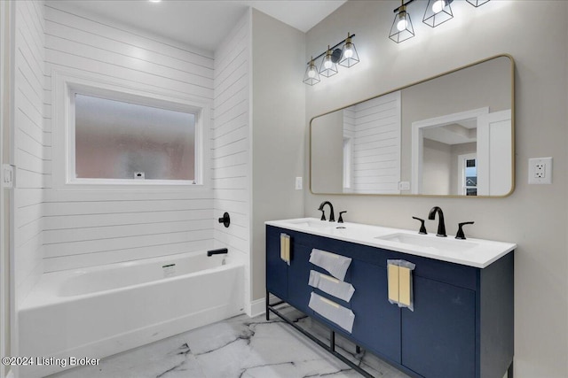 bathroom featuring vanity and bathing tub / shower combination