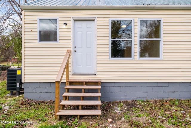 property entrance featuring cooling unit