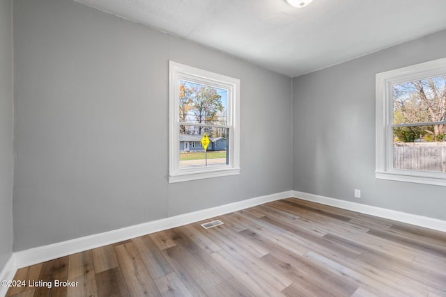 empty room with light wood-type flooring