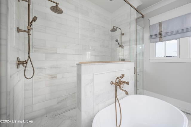 bathroom featuring separate shower and tub