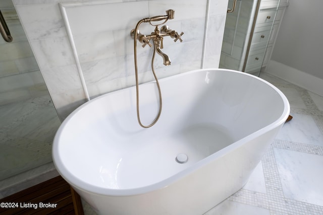 bathroom with a washtub