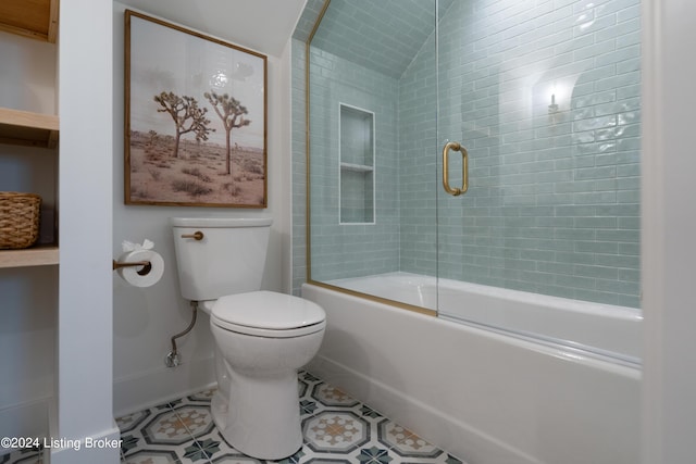 bathroom with toilet, tile patterned flooring, and enclosed tub / shower combo