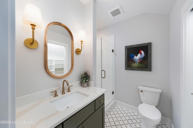 bathroom featuring walk in shower, vanity, toilet, and vaulted ceiling