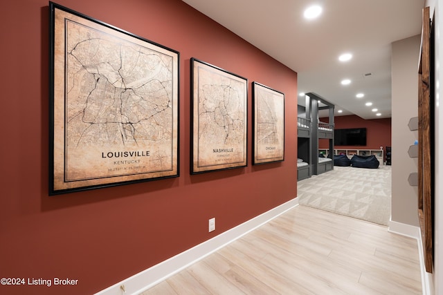 corridor featuring light hardwood / wood-style flooring