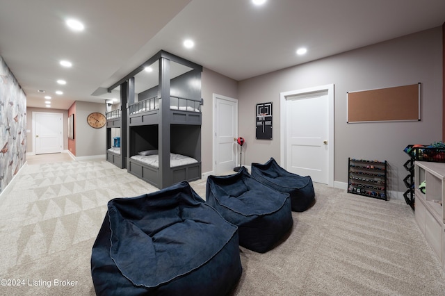 bedroom with light colored carpet