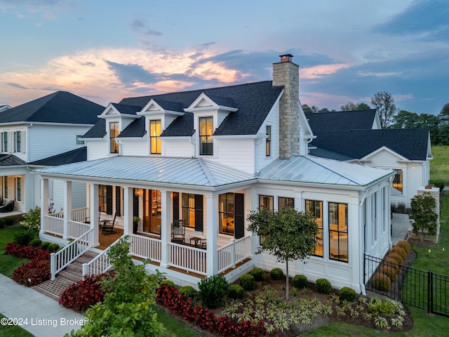 view of front of home featuring covered porch