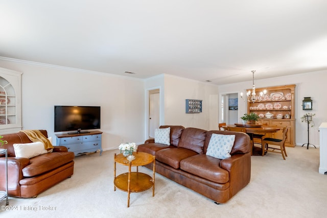 carpeted living room with crown molding and an inviting chandelier