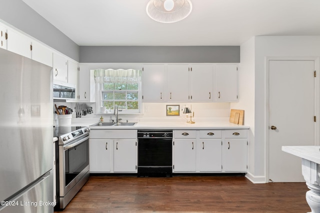 kitchen featuring dark hardwood / wood-style floors, white cabinetry, sink, and appliances with stainless steel finishes