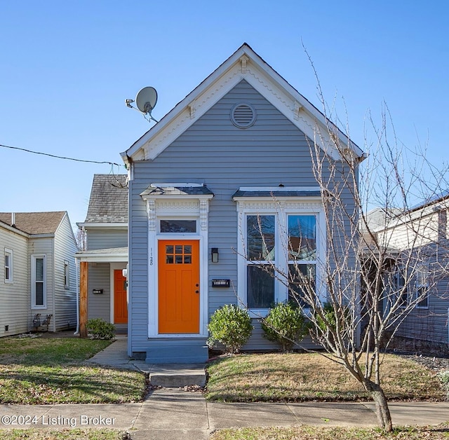 view of front of property with a front lawn