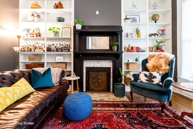 living area featuring hardwood / wood-style floors