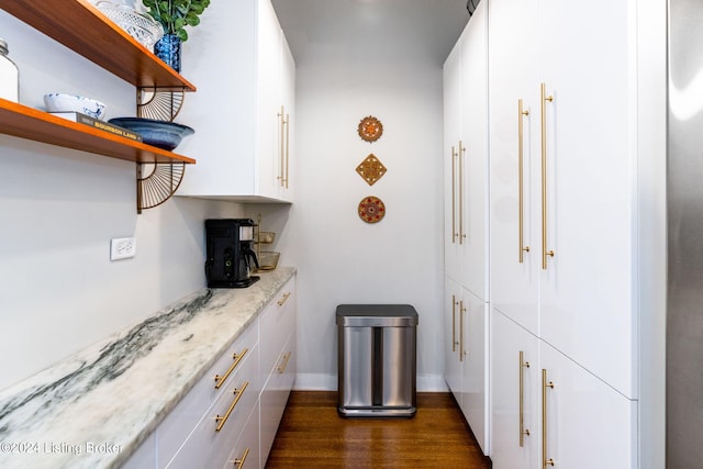 interior space with dark hardwood / wood-style flooring