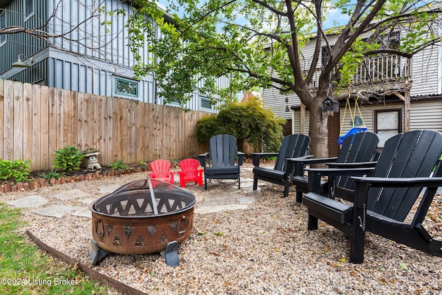 view of patio featuring an outdoor fire pit