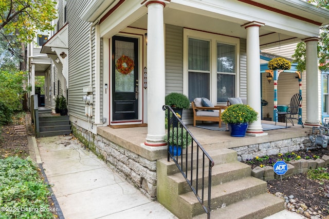 entrance to property with a porch