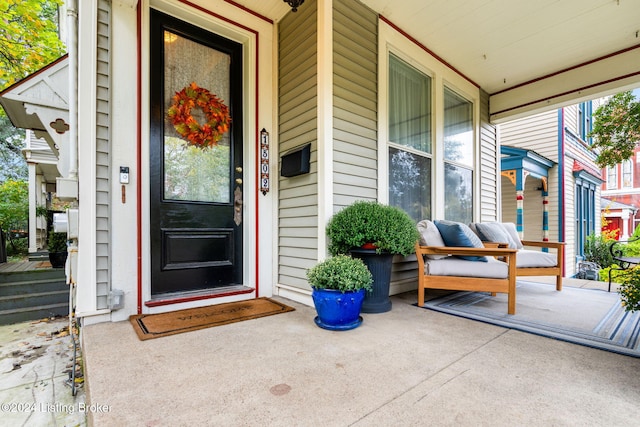 entrance to property with a porch