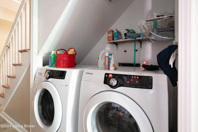 washroom with independent washer and dryer