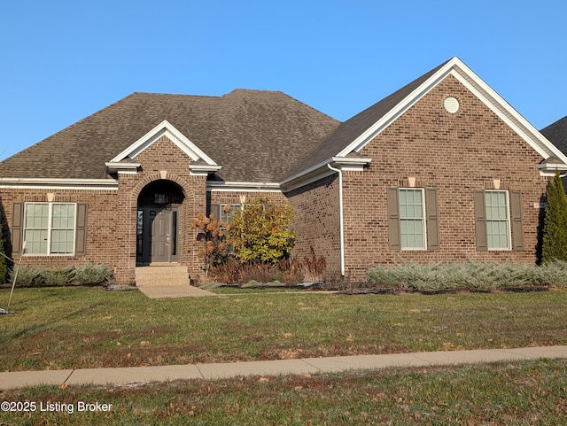 front facade with a front yard