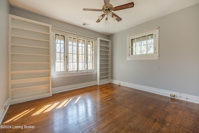 spare room featuring ceiling fan and wood-type flooring