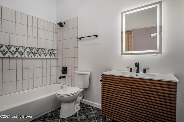 full bathroom with vanity, toilet, and tiled shower / bath combo