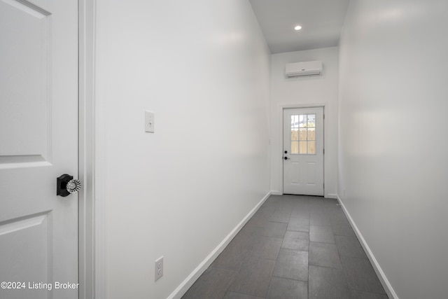 entryway featuring a wall unit AC