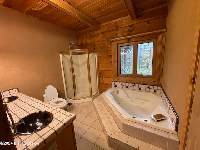 full bathroom with tile patterned floors, independent shower and bath, toilet, beamed ceiling, and wooden ceiling