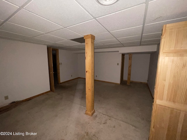 basement featuring a drop ceiling