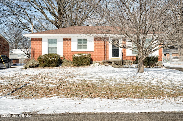 view of front of home with brick siding