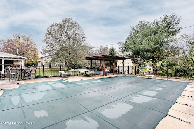 view of swimming pool with a patio