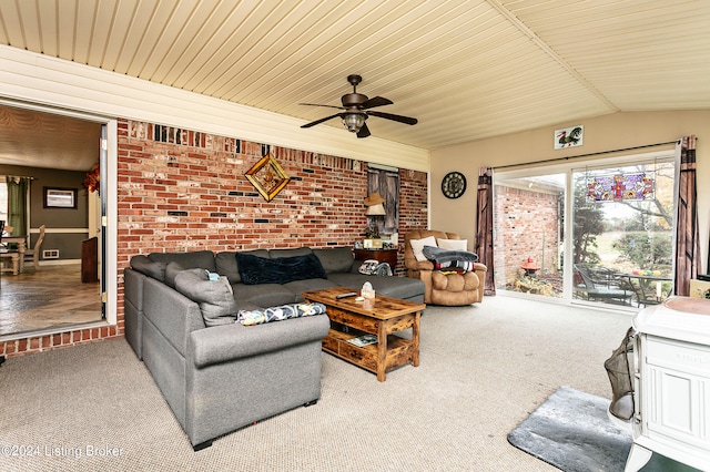 living room featuring brick wall, ceiling fan, carpet, wood ceiling, and vaulted ceiling