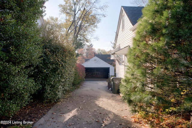 view of property exterior featuring a garage