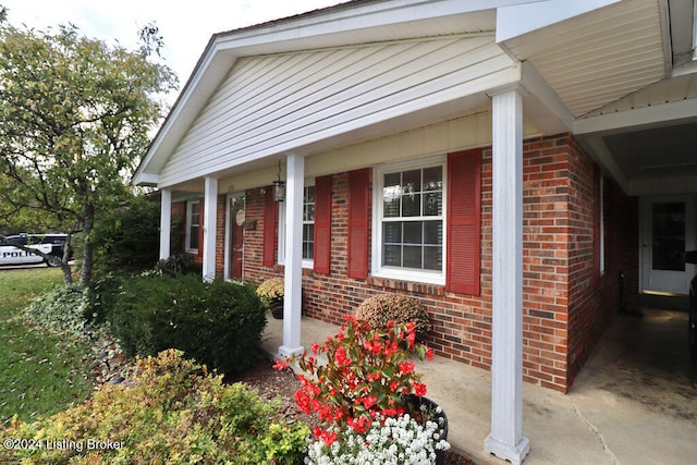 property entrance with a porch