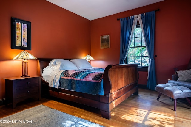 bedroom with light hardwood / wood-style floors