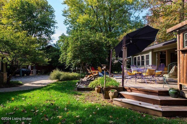 view of yard featuring a deck