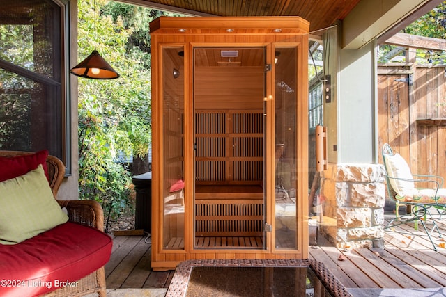 view of sauna / steam room featuring wood-type flooring and wooden ceiling