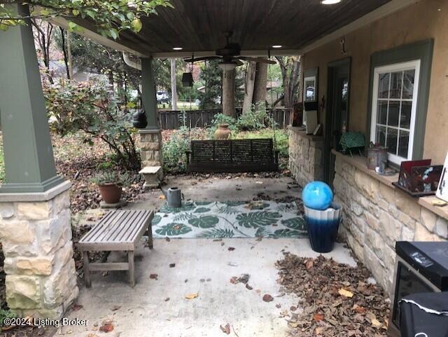 view of patio with a porch and ceiling fan