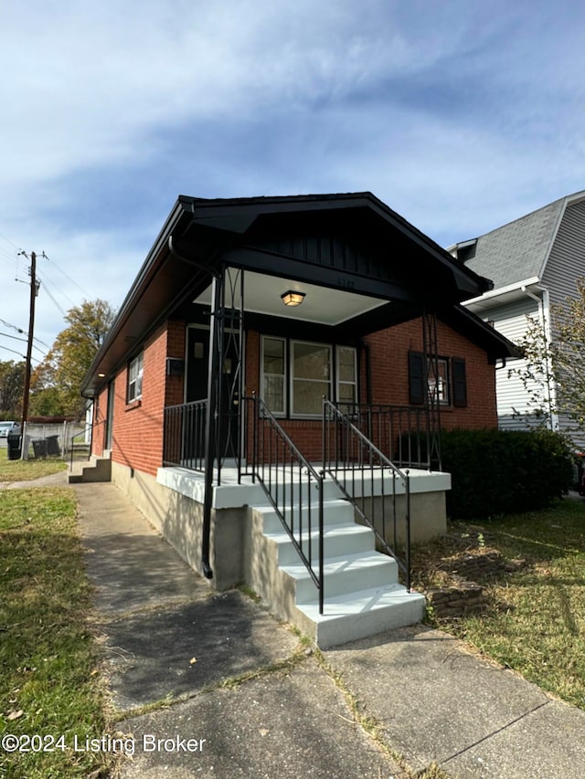 view of front of house with covered porch