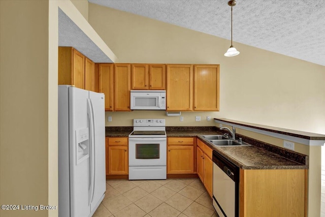 kitchen featuring vaulted ceiling, a textured ceiling, sink, pendant lighting, and white appliances