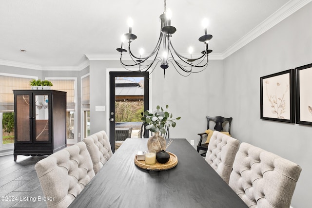 dining area featuring an inviting chandelier and ornamental molding