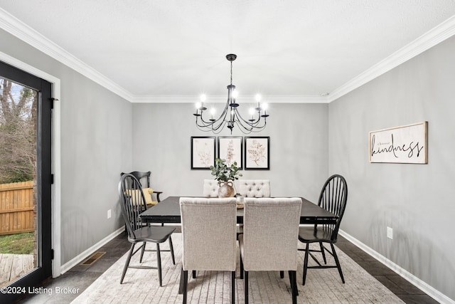 dining area with ornamental molding and a notable chandelier