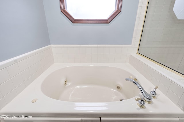 bathroom with a washtub