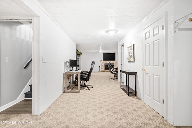 office with carpet flooring, a textured ceiling, and crown molding