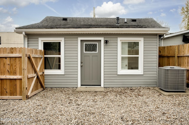 back of property with central air condition unit