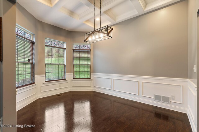 304 Hidden Falls Dr, Mt Washington, KY 40047 - unfurnished room with a chandelier, beam ceiling, coffered ceiling, dark wood finished floors, and wainscoting