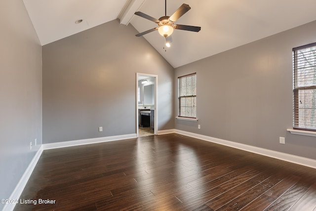 empty room with high vaulted ceiling, dark hardwood / wood-style floors, ceiling fan, and beam ceiling