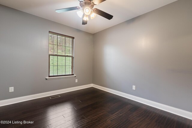 304 Hidden Falls Dr, Mt Washington, KY 40047 - spare room with baseboards, ceiling fan, and dark wood-type flooring