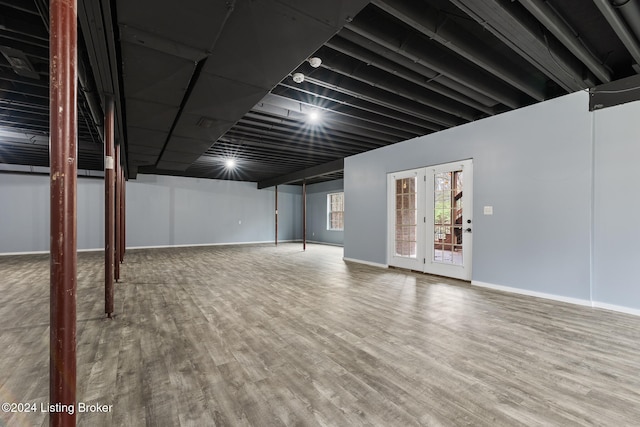 basement featuring wood-type flooring